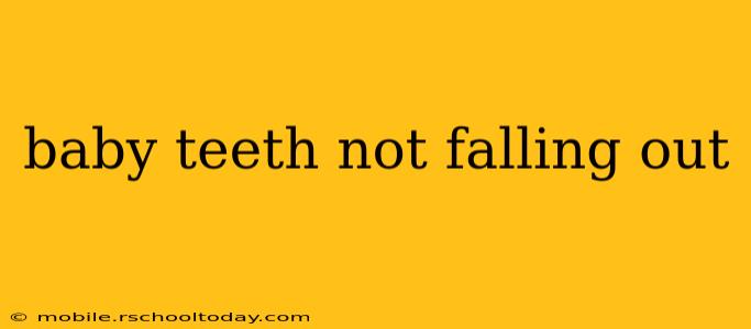 baby teeth not falling out