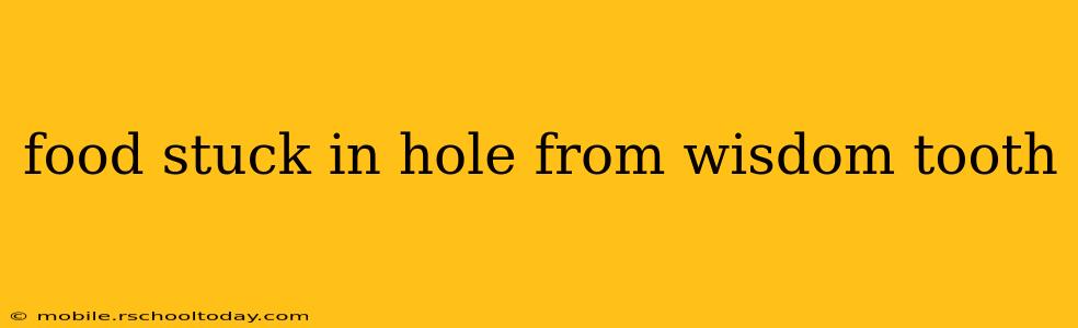 food stuck in hole from wisdom tooth
