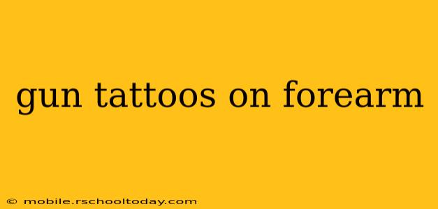 gun tattoos on forearm