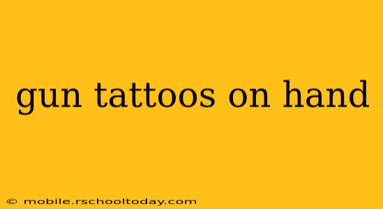 gun tattoos on hand