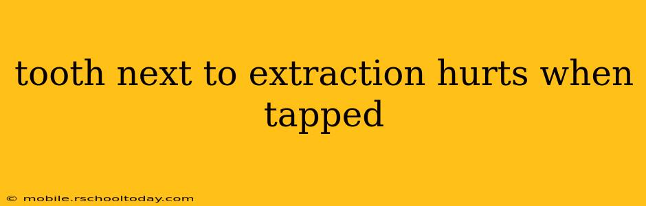 tooth next to extraction hurts when tapped